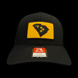 Richardson 110 Black And Gold Has No Borders Fitted Trucker Hat
