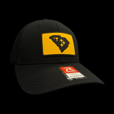 Richardson 110 Black And Gold Has No Borders Fitted Trucker Hat