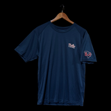 Remember “J” Muller Give Back Navy Performance Tee