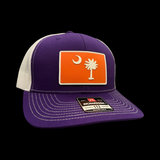 Richardson 112 Purple Palmetto Moon Orange Performance PVC Trucker Hat