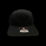 803 Richardson 112 Blackout Trucker Hat