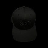 803 Yupoong Black Trucker - silver logo
