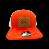 803 Richardson Orange - White Leather Patch Trucker