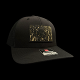 Richardson 112 Bigfoot Blackout Bottomland Performance Trucker Hat