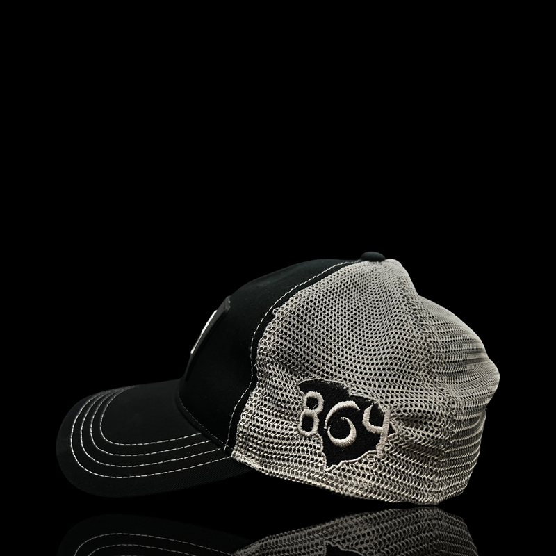 864 Richardson Performance PVC Patch Relaxed Black Steel Trucker Hat