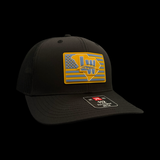 Richardson 112 Black Lake Wylie Nation Performance Trucker Hat
