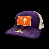 Richardson 112 Purple Palmetto Moon Orange Performance PVC Trucker Hat